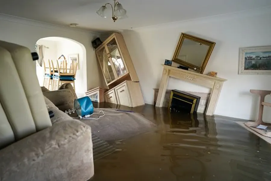 Emergency Water Damage Insurance Process Living Room Flooded